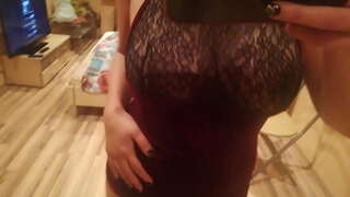 Doing a stip dance in front of the mirror showing nipples